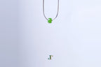 PASTILLE Pure 6×3 · Willow Green — nephrite jade pastille necklace, hanging