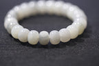 PILLAR Pill 12×9 · Ink Wash — nephrite jade cylinder bracelet, on the hand