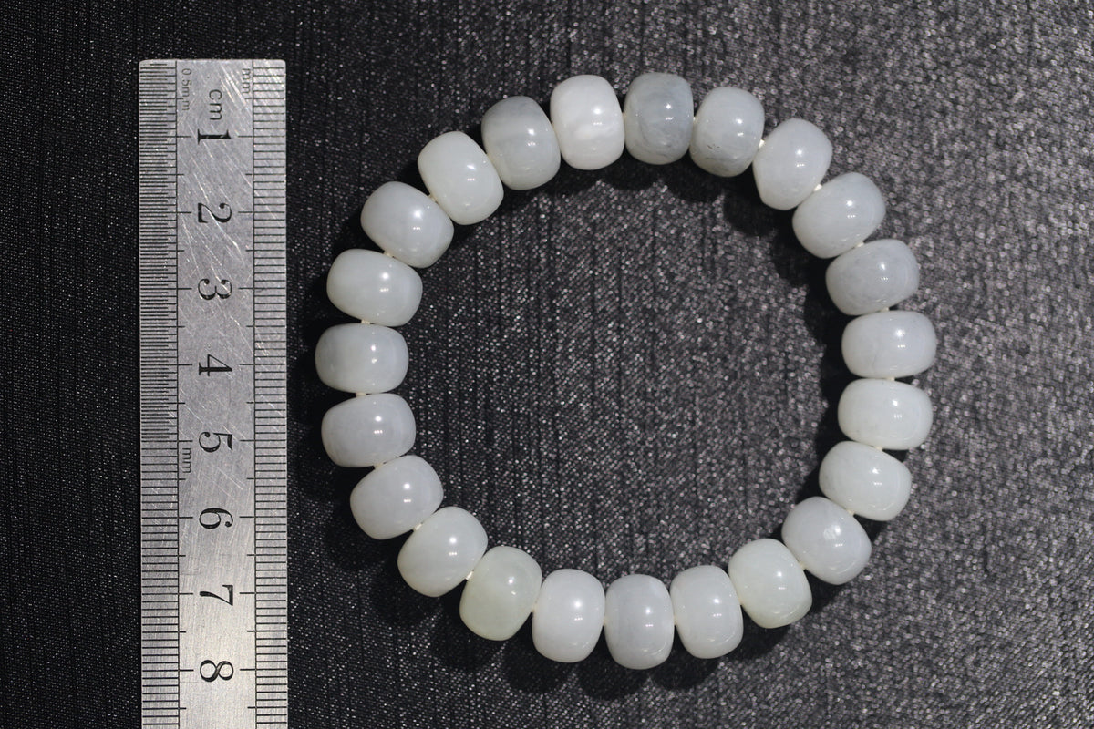 PILLAR Pill 12×9 · Ink Wash — nephrite jade cylinder bracelet, size reference