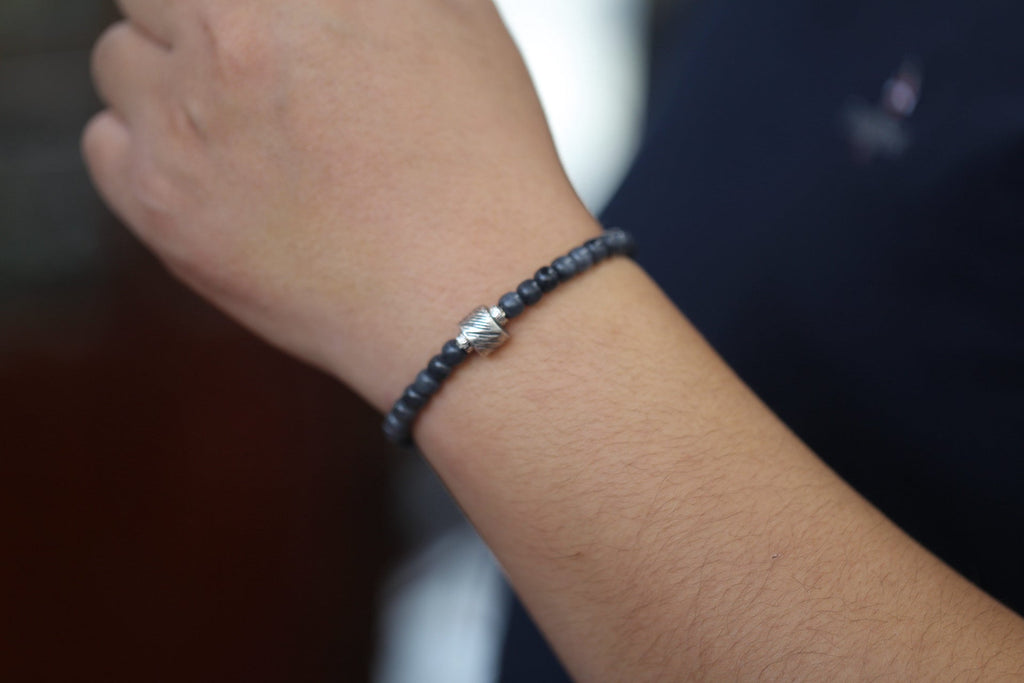 PILLAR Pill 6×5 · Ink Wash — nephrite jade cylinder bracelet, on the hand