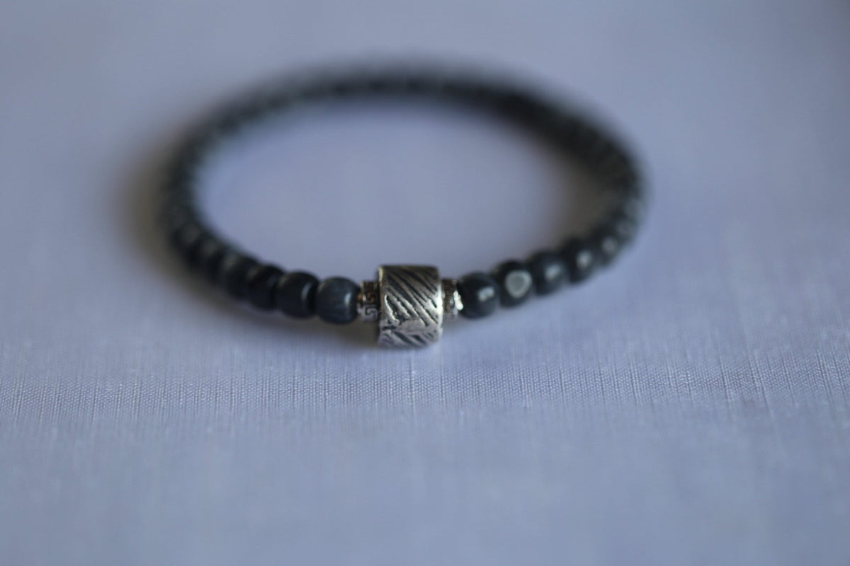 PILLAR Pill 6×5 · Ink Wash — nephrite jade cylinder bracelet, setting detail