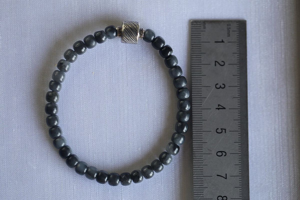 PILLAR Pill 6×5 · Ink Wash — nephrite jade cylinder bracelet, size reference