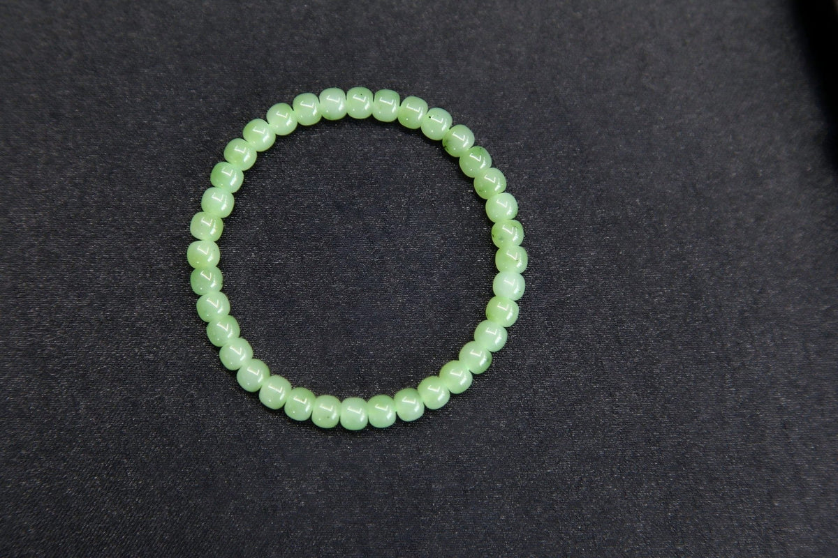 PILLAR Pill 6×5 · Willow Green — nephrite jade cylinder bracelet, front