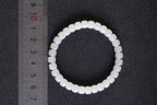 PILLAR Pill 6.7×5 · Suet White 1 — nephrite jade cylinder bracelet, size reference
