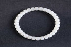 PILLAR Pill 6.7×5 · Suet White 1 — nephrite jade cylinder bracelet, front