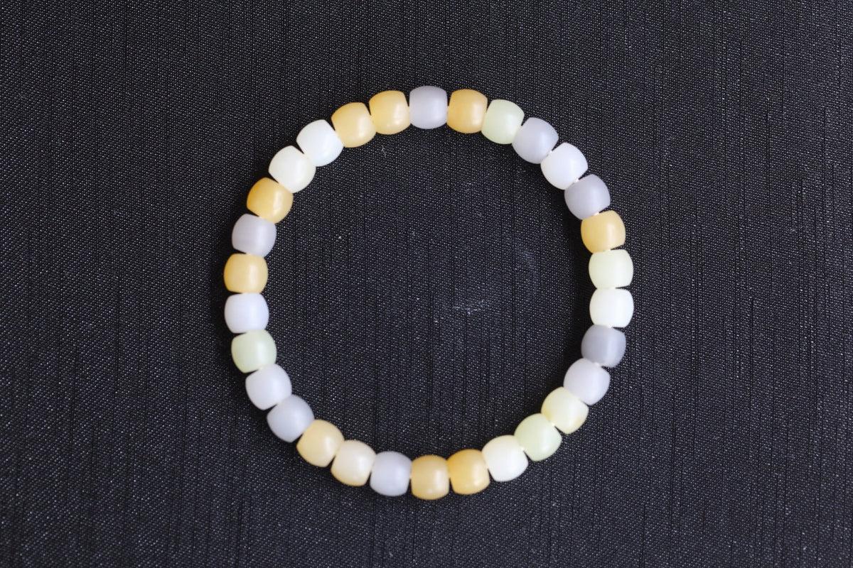 PILLAR Pill 7×6 · Multi-Colour — nephrite jade cylinder bracelet, front