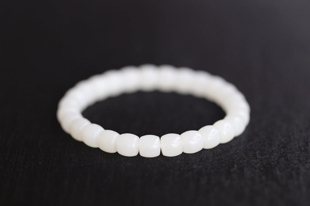PILLAR Pill 7.8×7.2 · Suet White — nephrite jade cylinder bracelet, detail