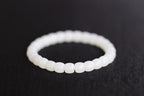 PILLAR Pill 7.8×7.2 · Suet White — nephrite jade cylinder bracelet, detail