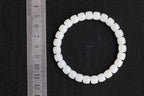 PILLAR Pill 7.8×7.2 · Suet White — nephrite jade cylinder bracelet, size reference