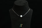 PILLAR Pure 10×9 · Suet White — nephrite jade cylinder necklace, on a display bust