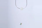 PILLAR Pure 10×9 · Suet White — nephrite jade cylinder necklace, hanging