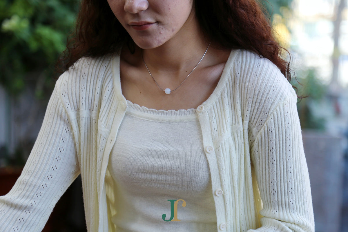PILLAR Pure 10×9 · Suet White — nephrite jade cylinder necklace, worn, second view