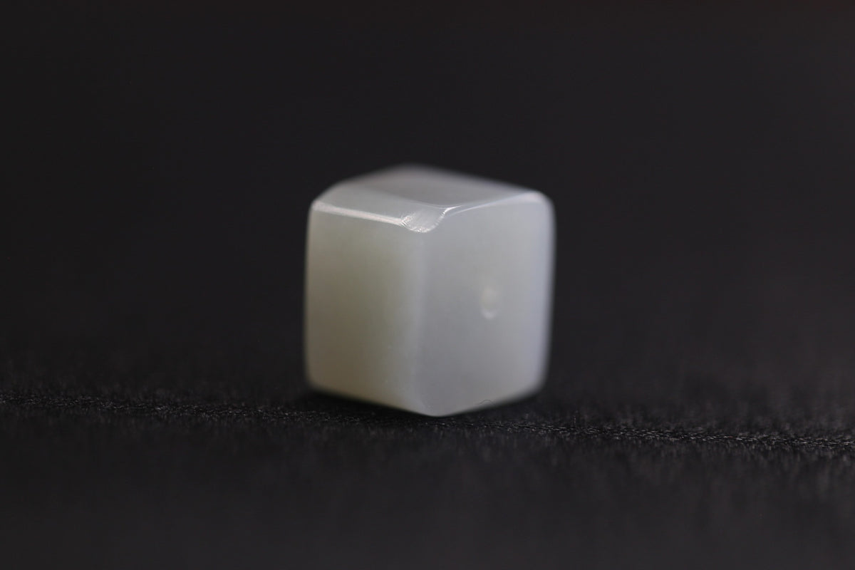 PILLAR Pure 12×9.5 · Willow Green — nephrite jade pendant, angled view