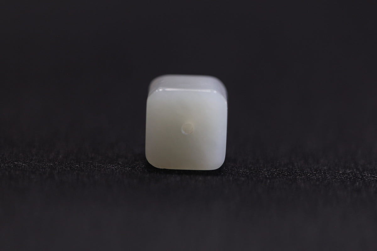 PILLAR Pure 12×9.5 · Willow Green — nephrite jade pendant, end view