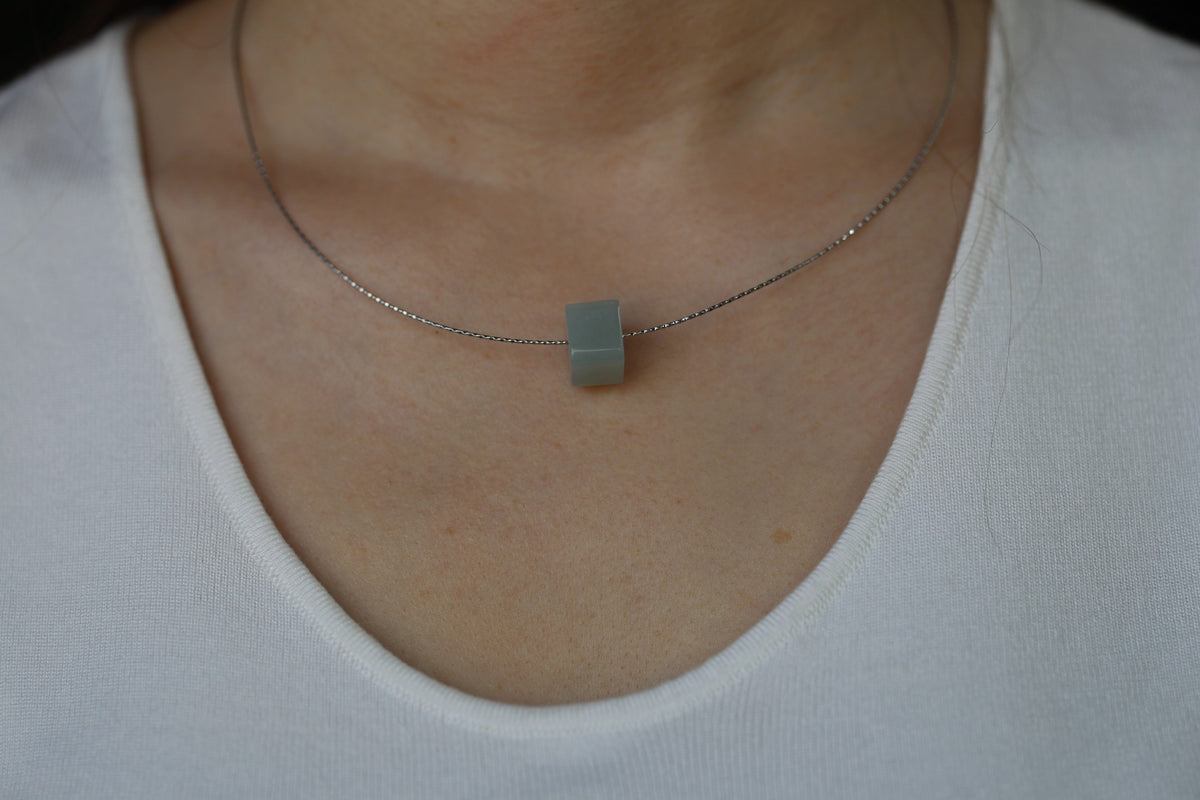 PILLAR Pure 12×9.5 · Willow Green — nephrite jade pendant, worn, second view
