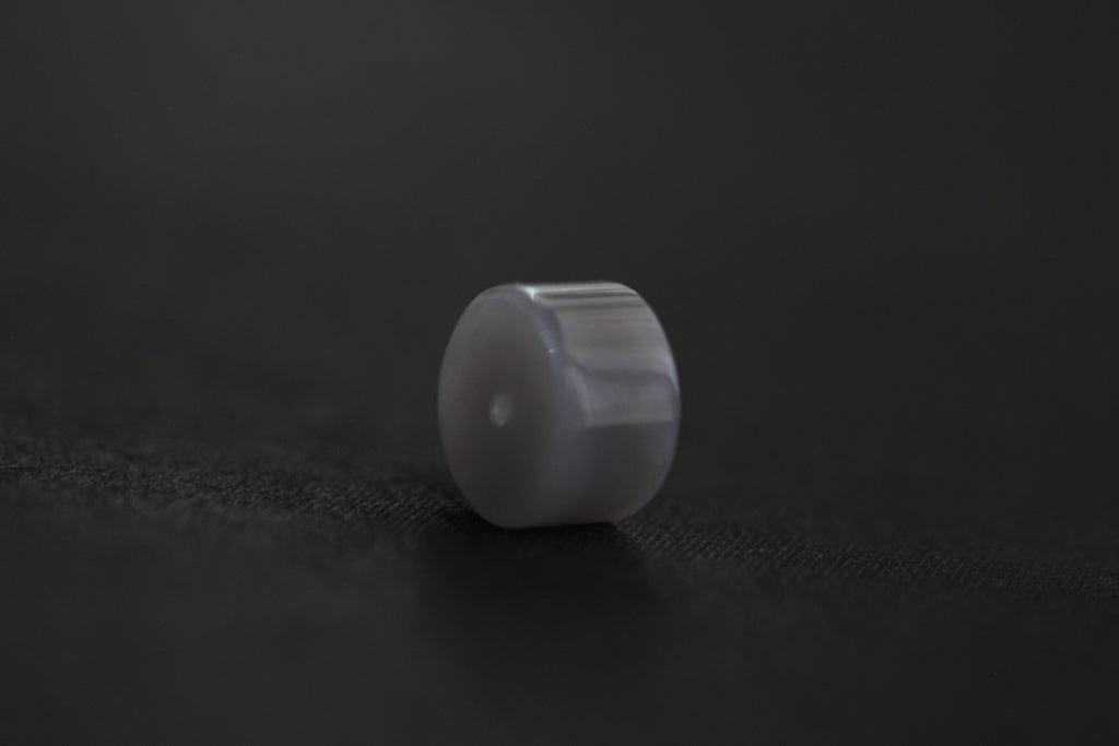 PILLAR Pure 15×9 · Smoky Lilac — nephrite jade pendant, angled view