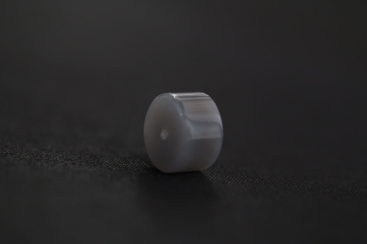 PILLAR Pure 15×9 · Smoky Lilac — nephrite jade pendant, angled view
