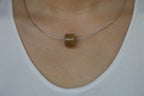 PILLAR Pure 16×12 · Multi-Colour — nephrite jade pendant, on the model
