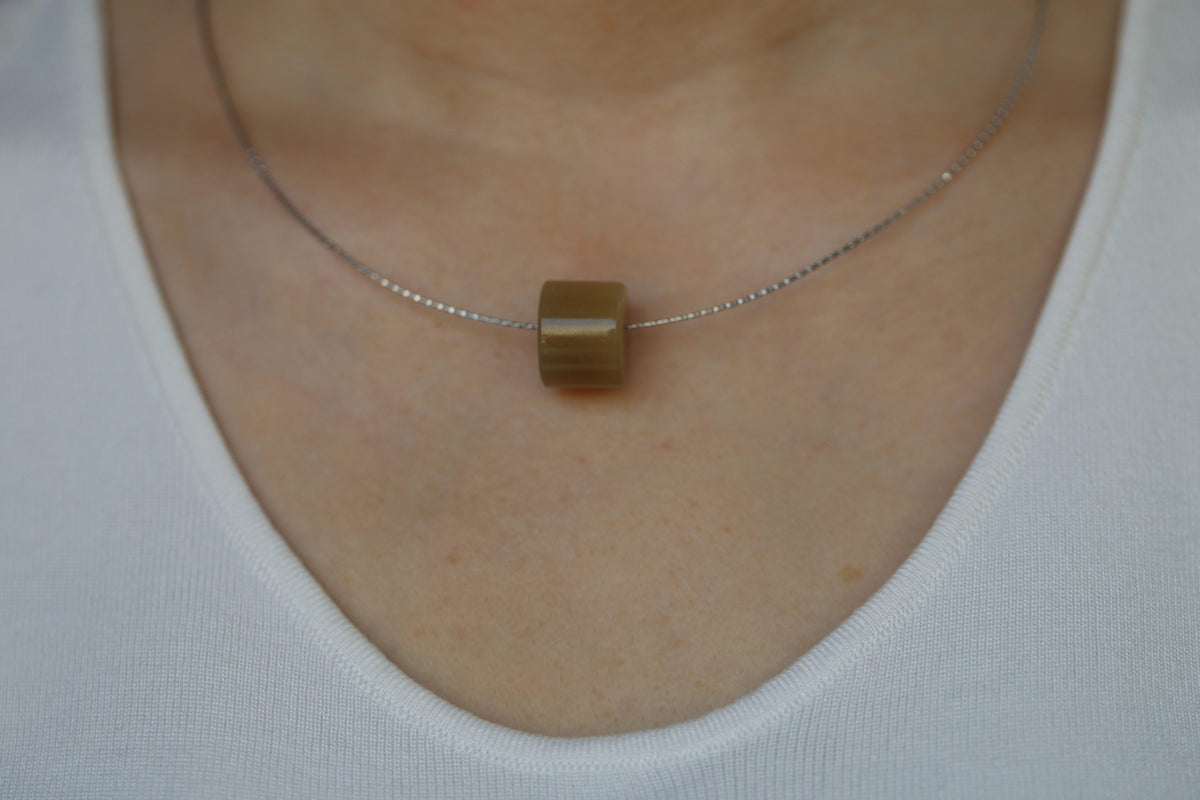 PILLAR Pure 16×12 · Multi-Colour — nephrite jade pendant, on the model