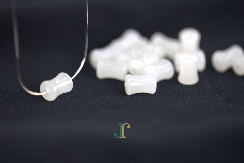 PILLAR Pure 6×12 · Suet White — nephrite jade cylinder necklace, on the chain
