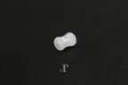 PILLAR Pure 6×12 · Suet White — nephrite jade cylinder necklace, end view