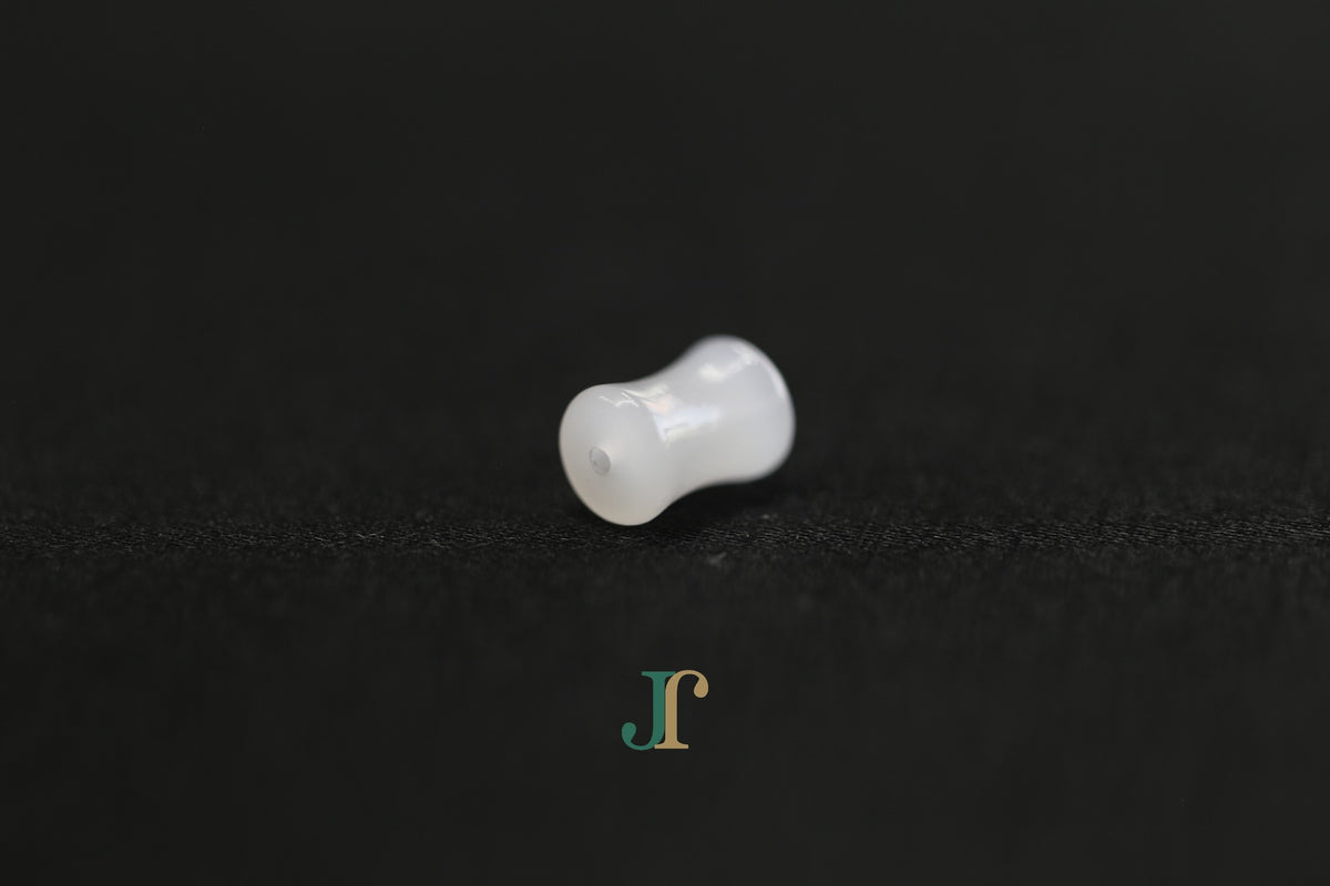 PILLAR Pure 6×12 · Suet White — nephrite jade cylinder necklace, end view