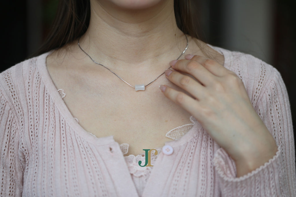 PILLAR Pure 6×12 · Suet White — nephrite jade cylinder necklace, worn, second view