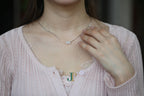 PILLAR Pure 6×12 · Suet White — nephrite jade cylinder necklace, worn, second view