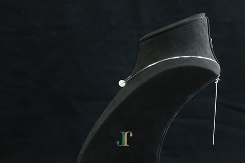PILLAR Pure 6×12 · Suet White — nephrite jade cylinder necklace, on a display bust, side view