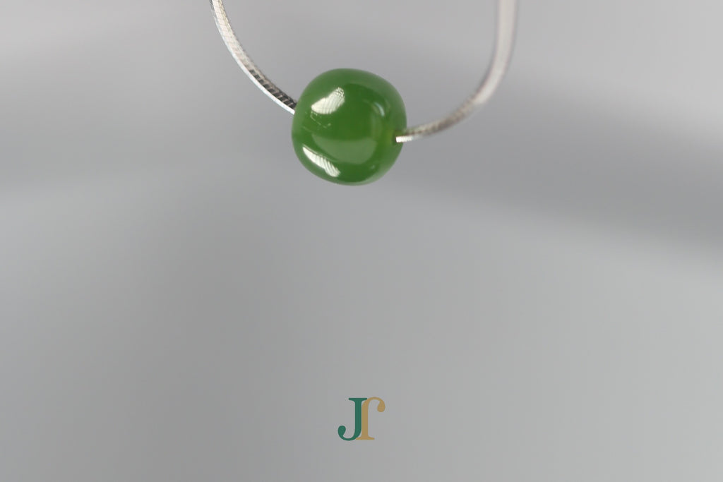 PILLAR Pure 7×6 · Spinach Green — nephrite jade cylinder necklace, hanging