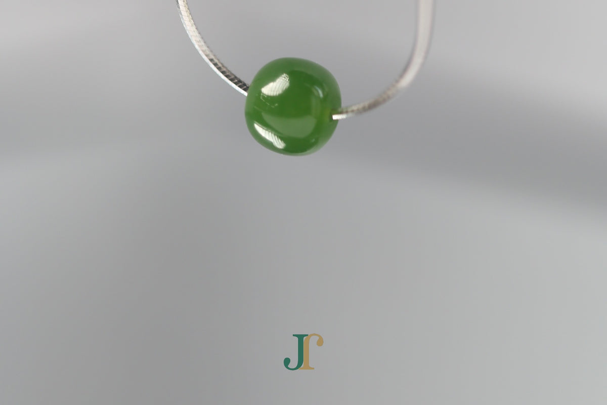 PILLAR Pure 7×6 · Spinach Green — nephrite jade cylinder necklace, hanging