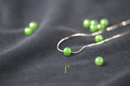 PILLAR Pure 7×6 · Spinach Green — nephrite jade cylinder necklace, on the chain