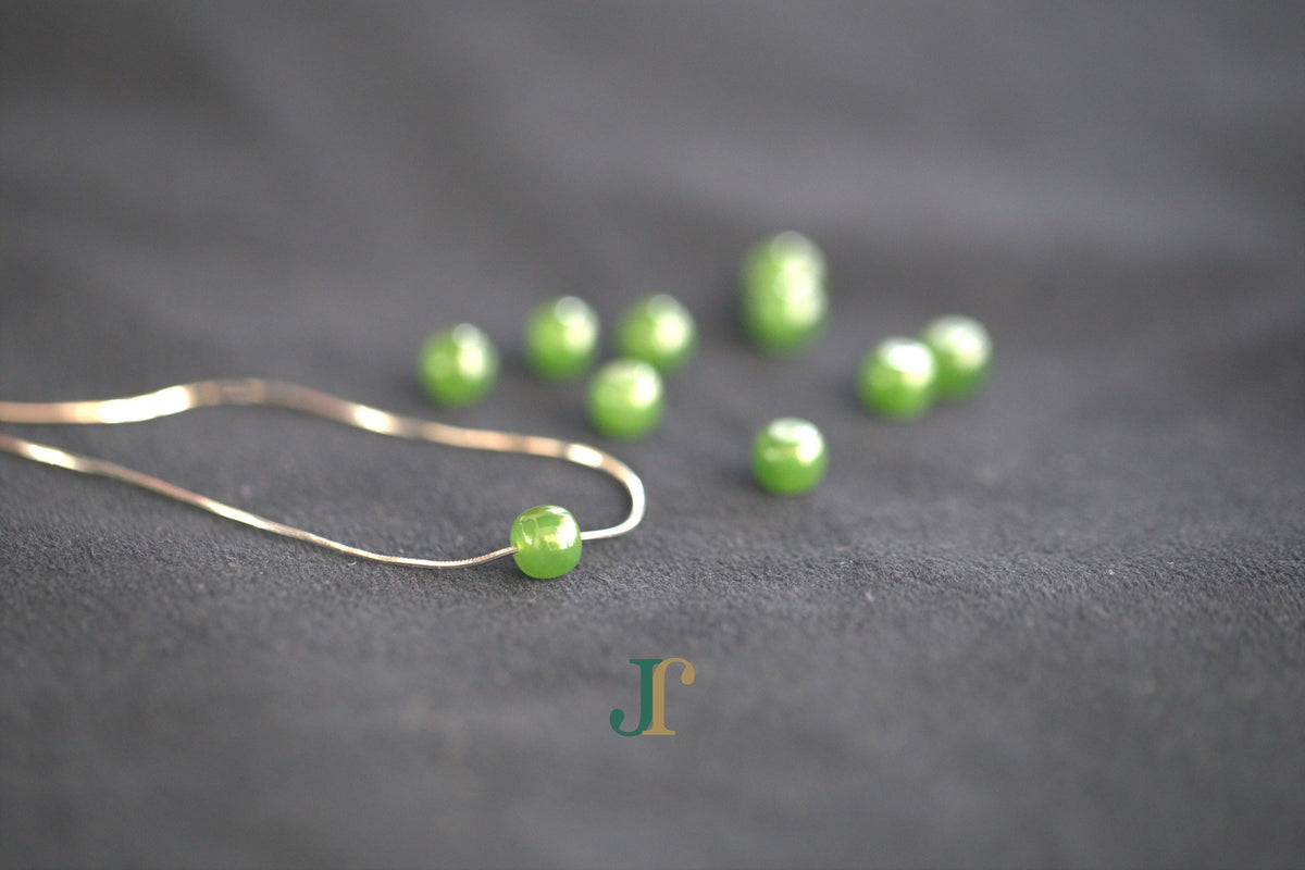 PILLAR Pure 7×6 · Spinach Green — nephrite jade cylinder necklace, on the chain, second view