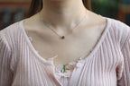 PILLAR Pure 7×6 · Spinach Green — nephrite jade cylinder necklace, worn, second view