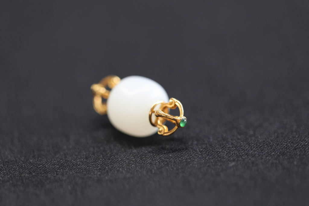 PILLAR Roller 13×14 · Suet White — nephrite jade pendant, detail