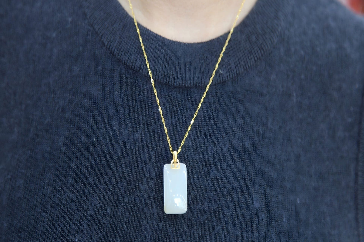 TABULA 001 · Suet White — nephrite jade pendant, front