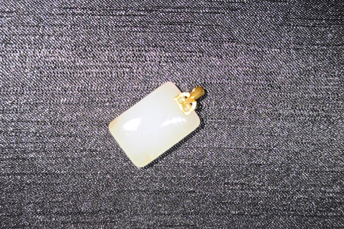 TABULA 001 · Suet White — nephrite jade pendant, detail