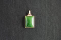 TABULA 003 · Spinach Green — nephrite jade pendant, front