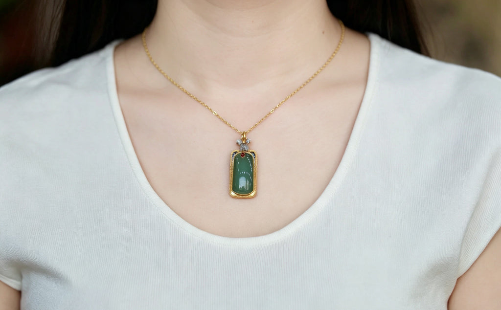 TABULA 006 · Willow Green — nephrite jade pendant, on the model