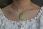 TABULA 008 · Golden Green — nephrite jade pendant, on the model