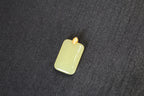 TABULA 009 · Golden Green — nephrite jade pendant, detail