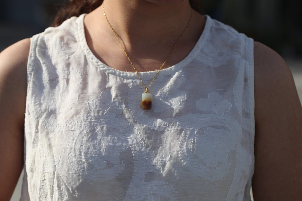 TABULA 010 · Multi-Colour — nephrite jade pendant, on the model