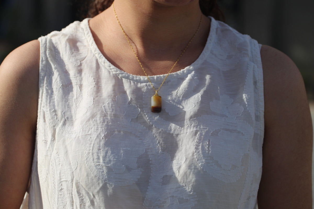 TABULA 012 · Multi-Colour — nephrite jade pendant, on the model