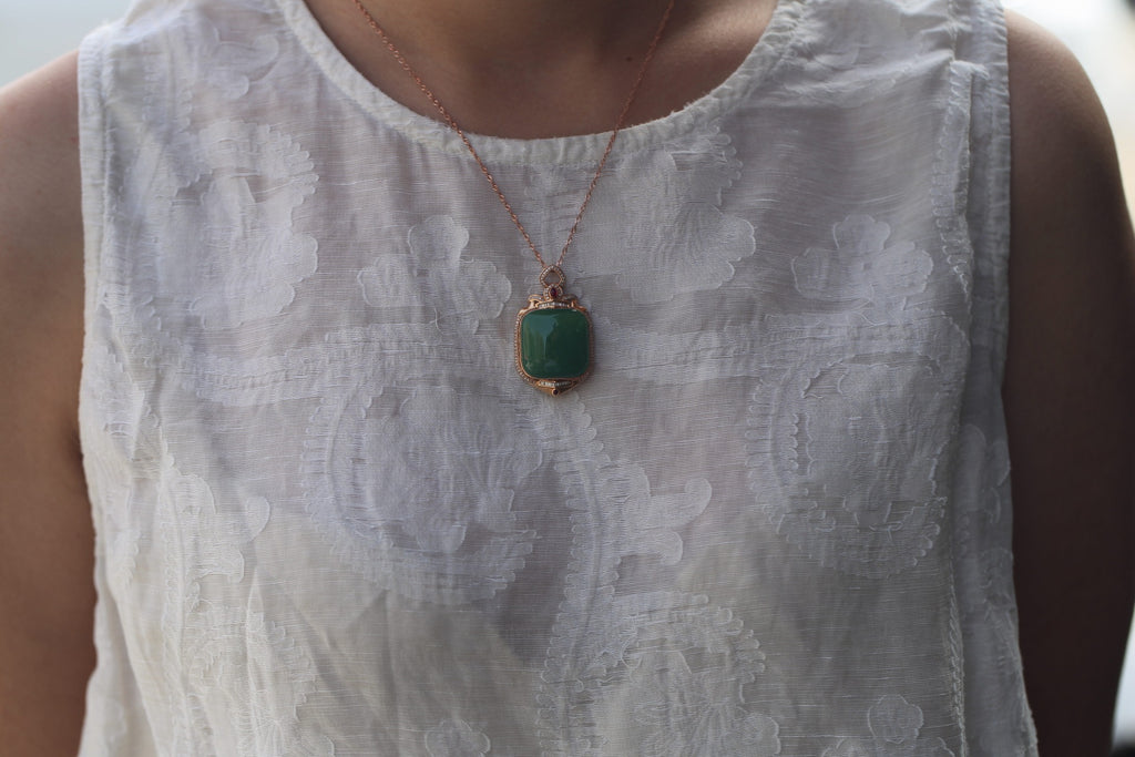 TABULA 014 · Willow Green — nephrite jade pendant, on the model