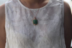 TABULA 014 · Willow Green — nephrite jade pendant, on the model