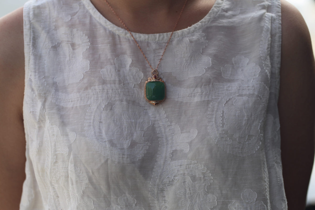 TABULA 014 · Willow Green — nephrite jade pendant, on the model, close