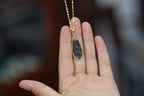 TABULA 016 · Ink Wash — nephrite jade pendant, in the hand