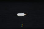 TABULA 018 · Suet White — nephrite jade pendant, side view
