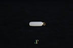 TABULA 019 · Suet White — nephrite jade pendant, side view