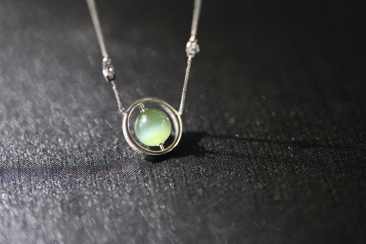 URANIA Planet · Cat's Eye — nephrite jade necklace, on the model